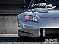 sstp_1102_06_o+2003_honda_s2000+front_right_headlight.jpg